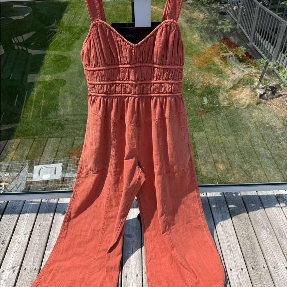 Free People Brown Jumpsuit with V-Neck and Wide-Leg Design